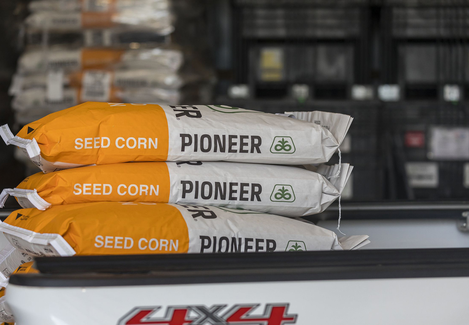 Pioneer seed corn bags - warehouse background